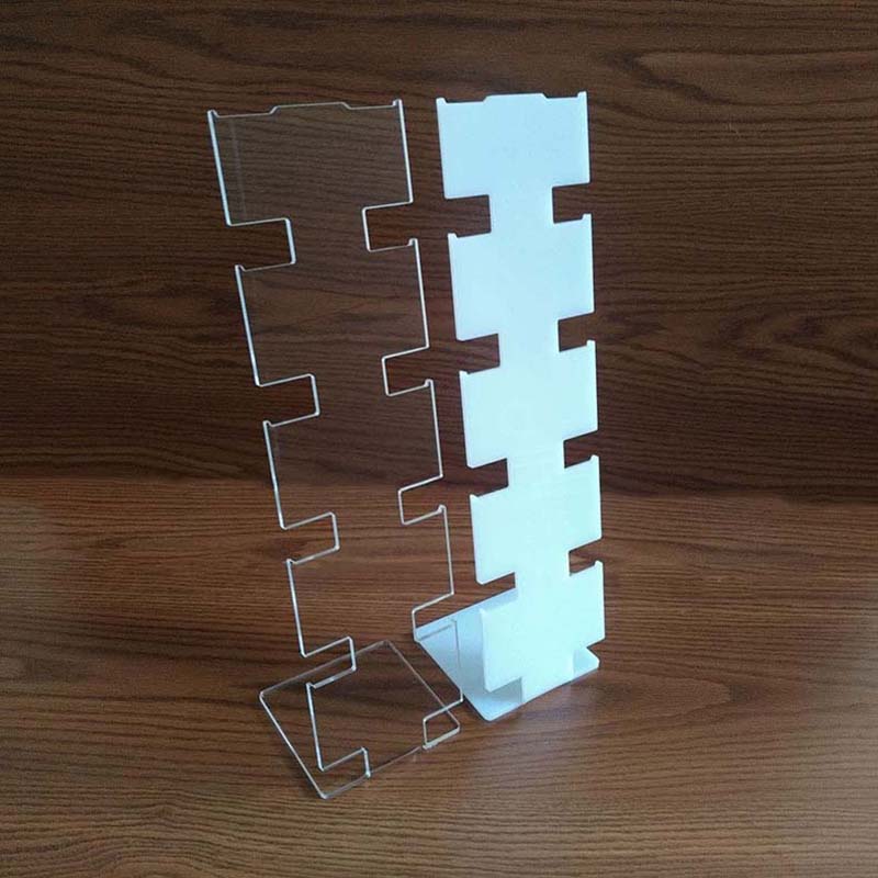 White L-shaped acrylic watch display stands
