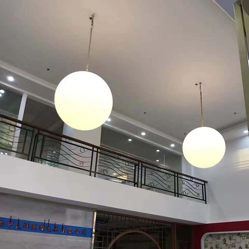 Custom-made large spherical chandeliers for hotel lobbies